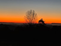 Sunrise from cozy back porch