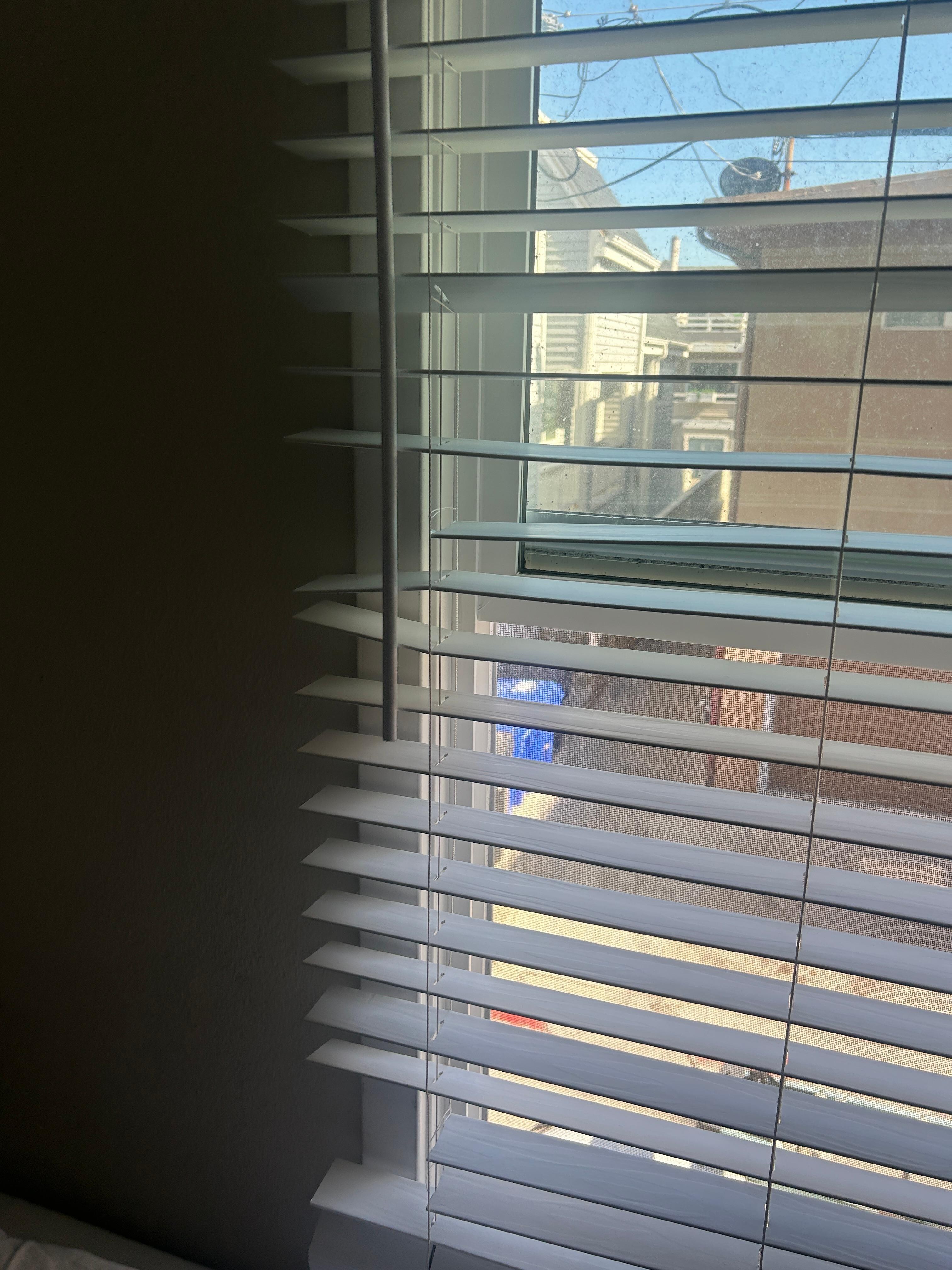 Upstairs bedroom blinds that don't rotate or close with broken blades