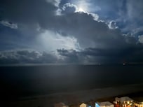 The only photo I managed to get without people in it looking at the ocean from front balcony was at night.