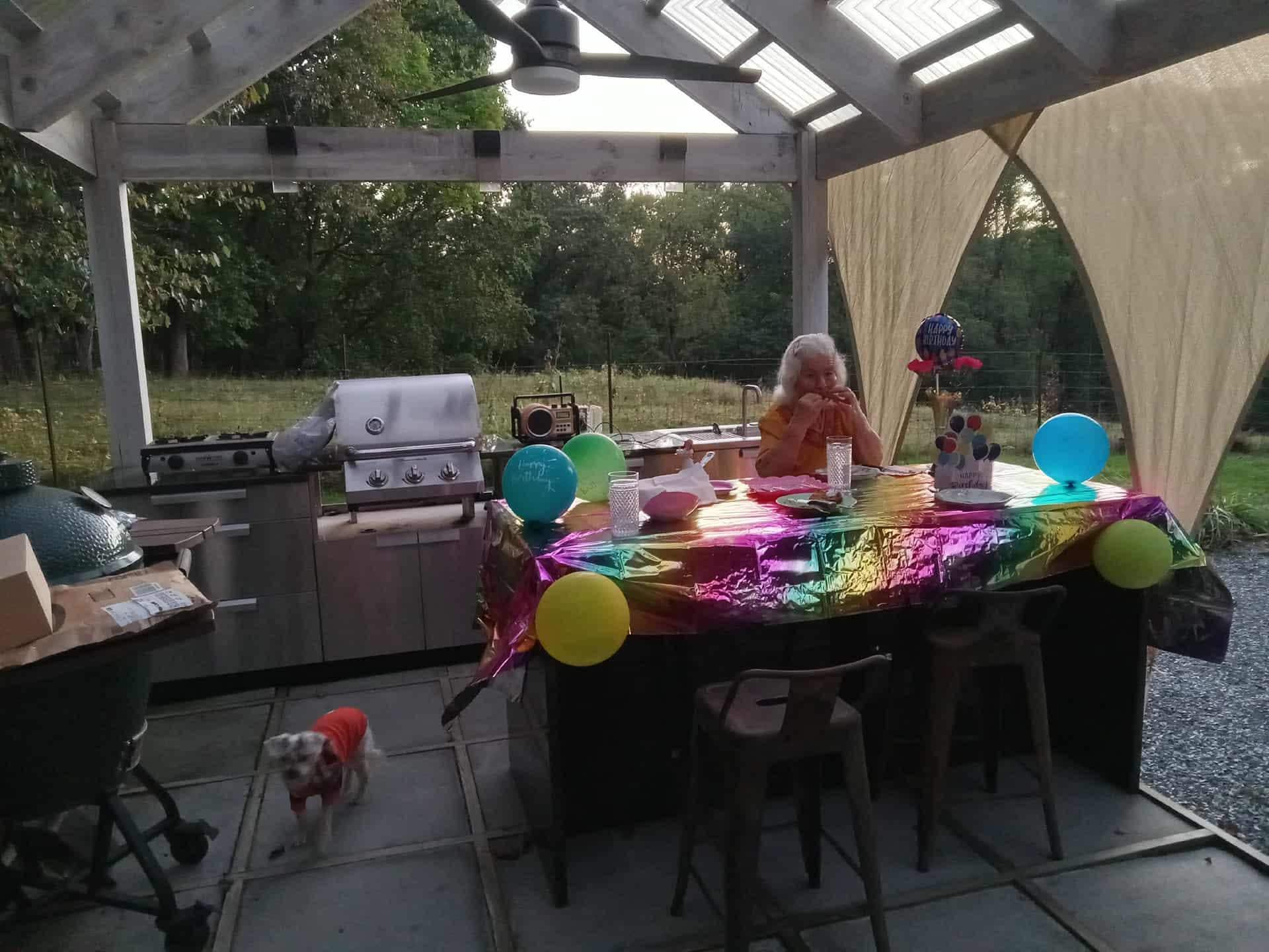 Mom and my furbaby waiting to cut the cake.