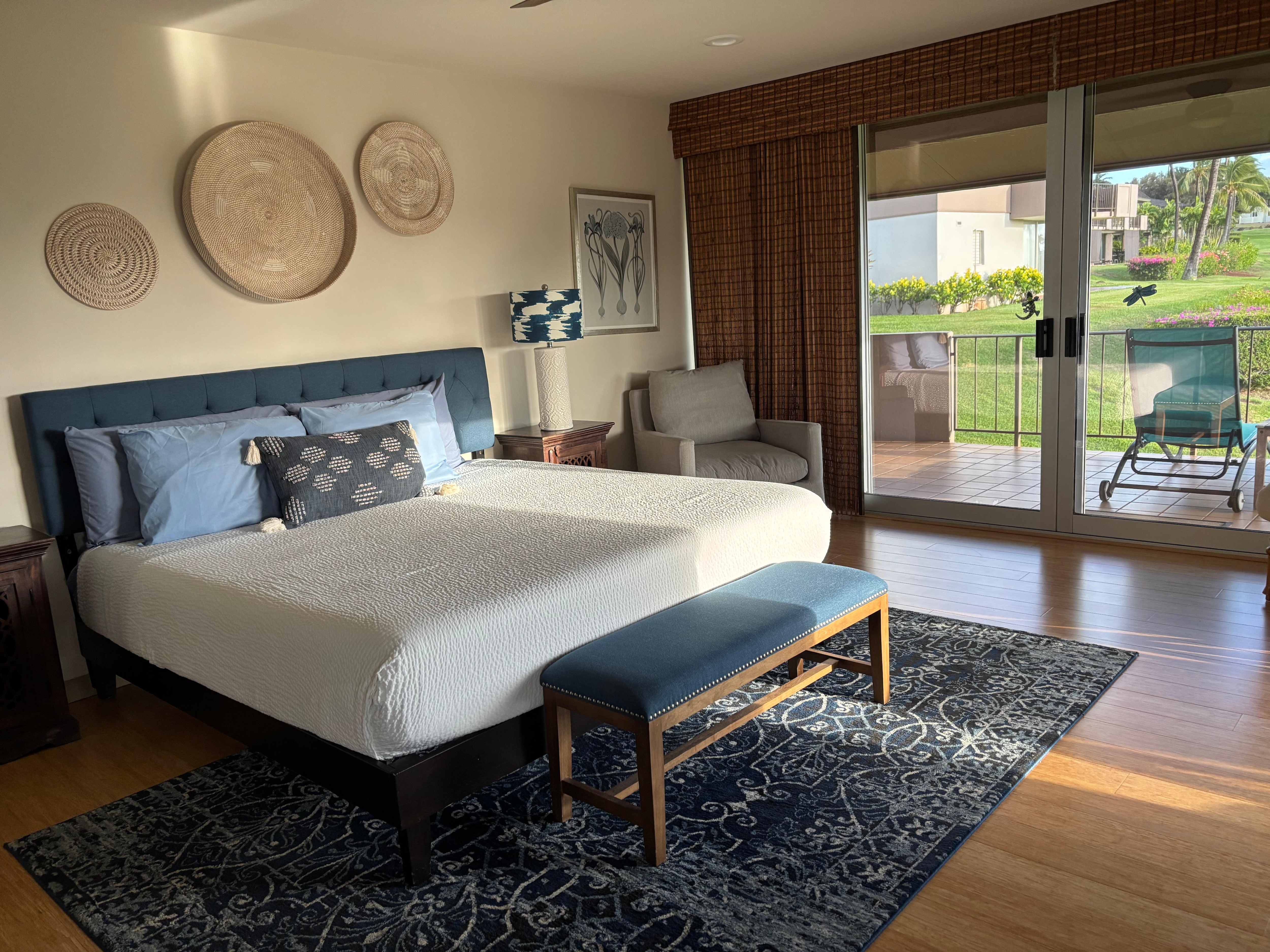 Large bedroom with King bed. Love the 2 sliding doors accessing the lanai. 