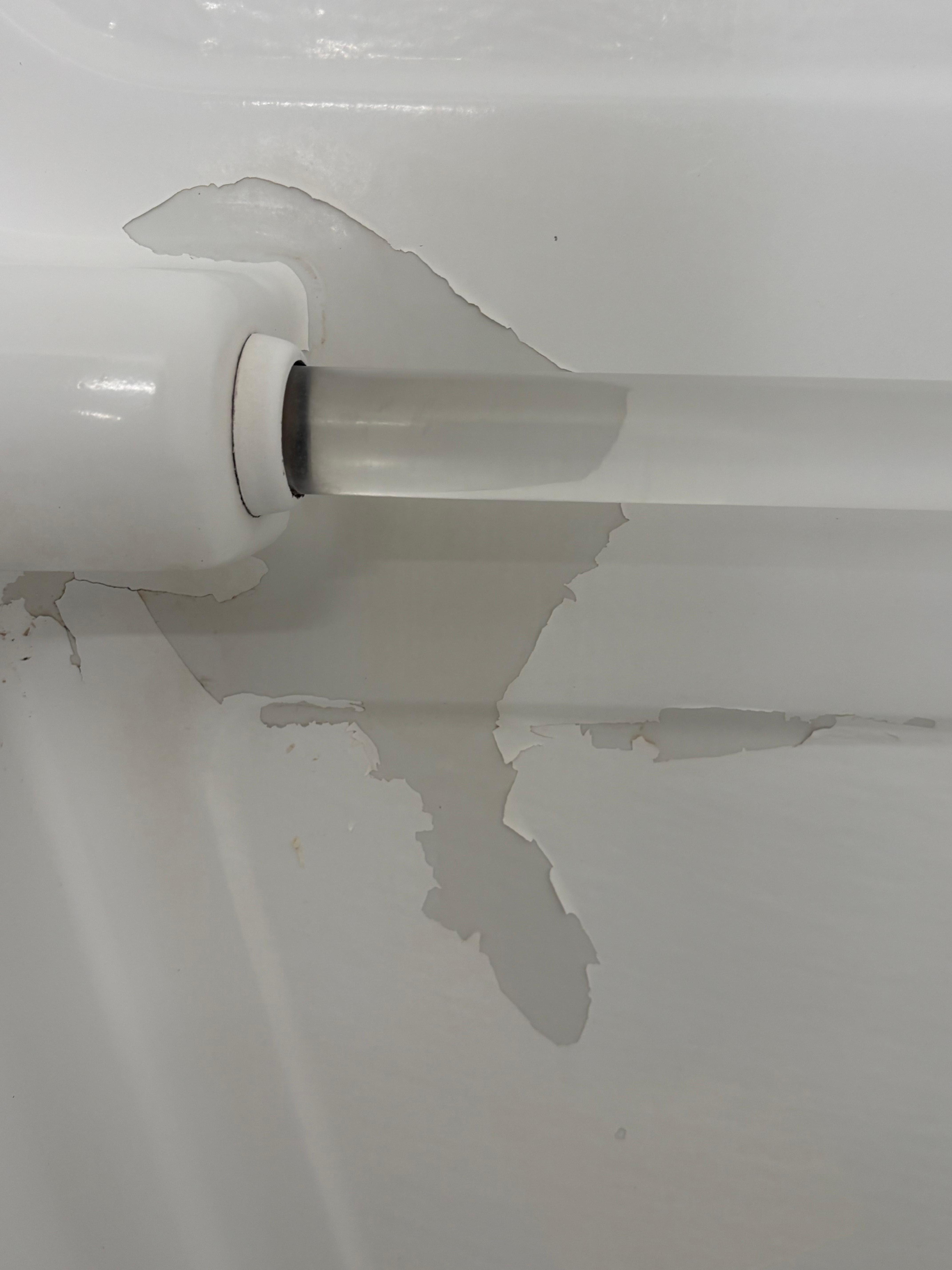 Dark area is where the refinishing material has peeled