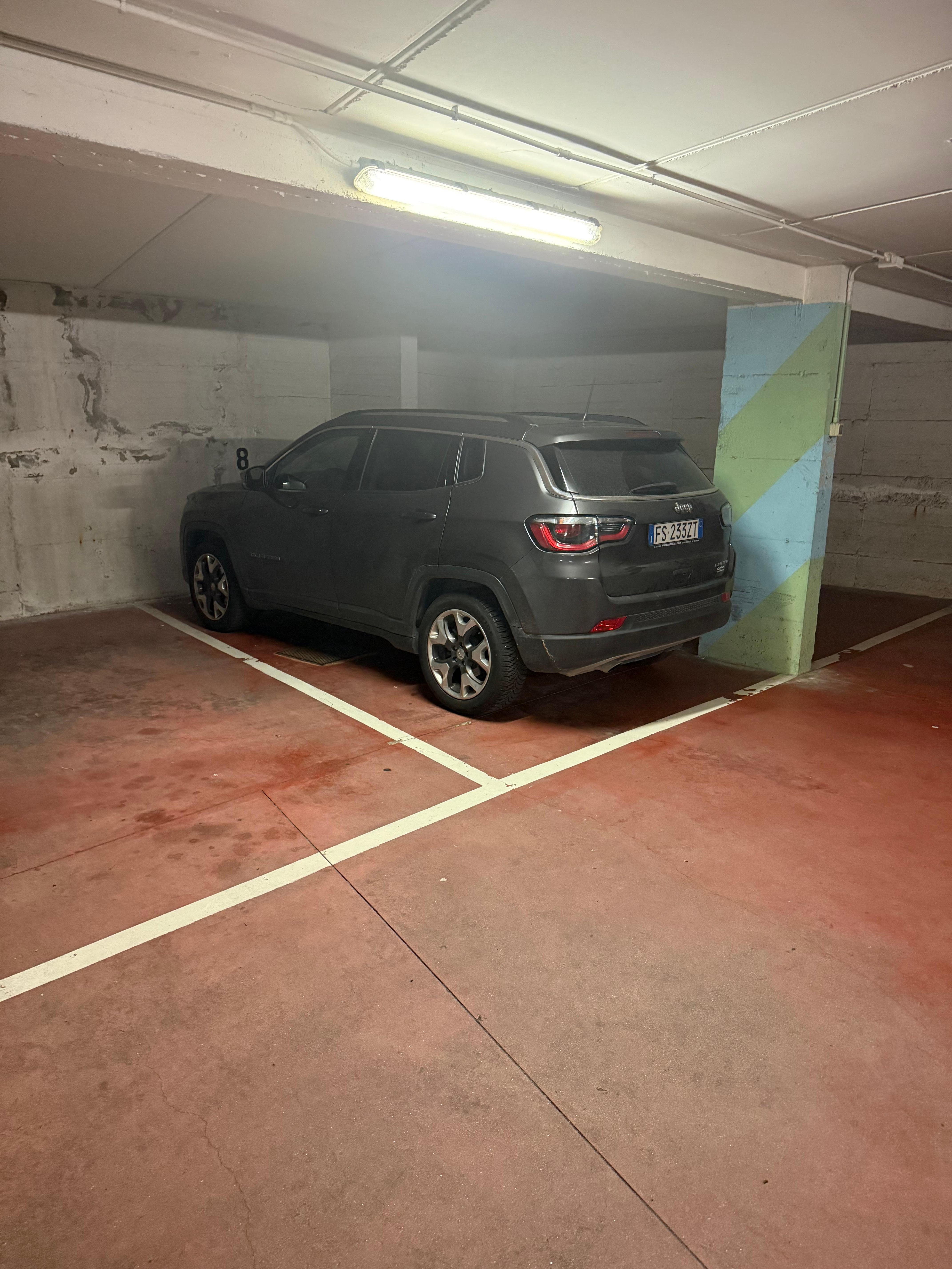 Inside parking garage. 