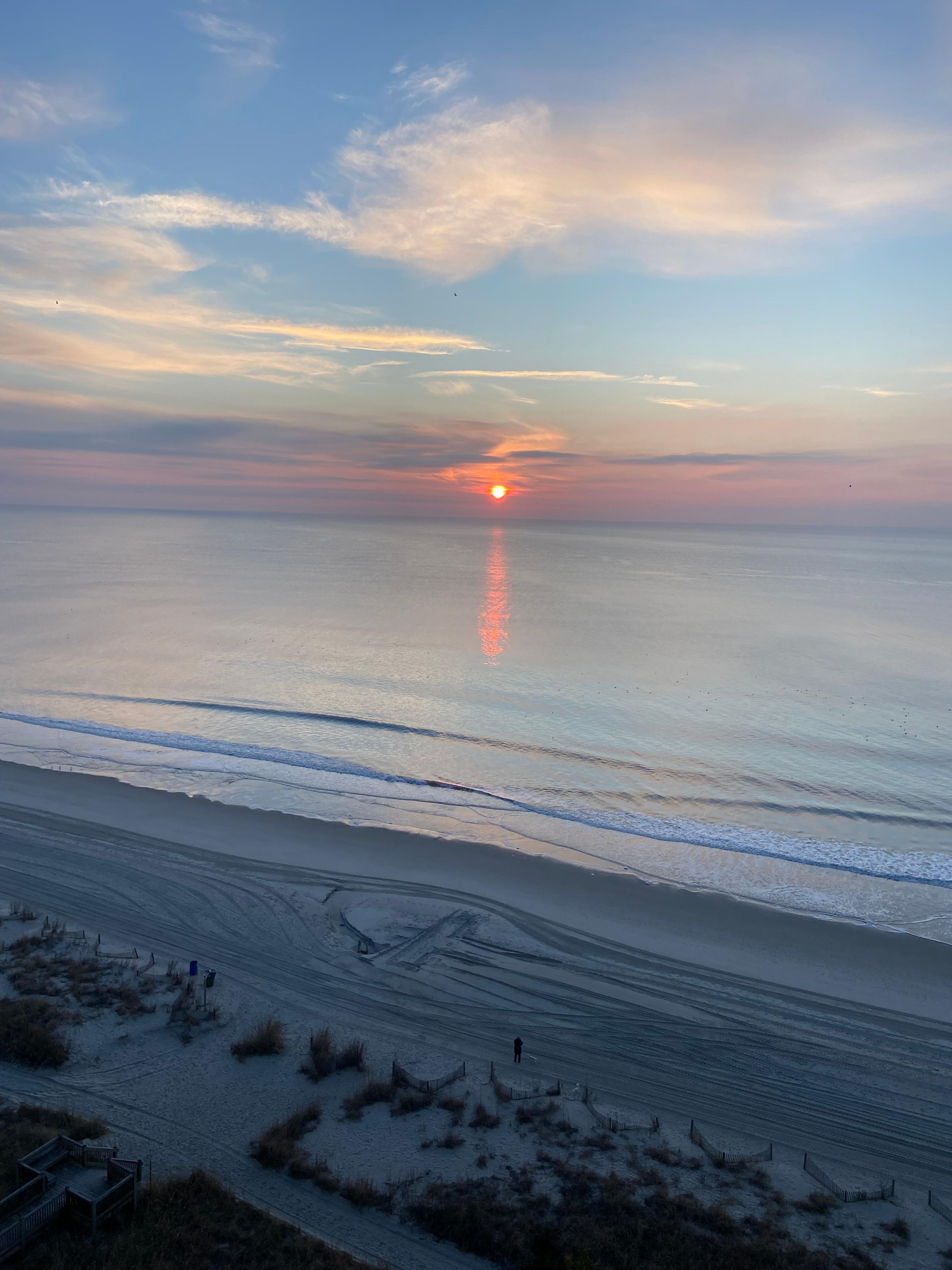 Sunrise over the ocean from the condo balcony 