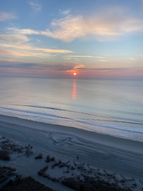 Sunrise over the ocean from the condo balcony