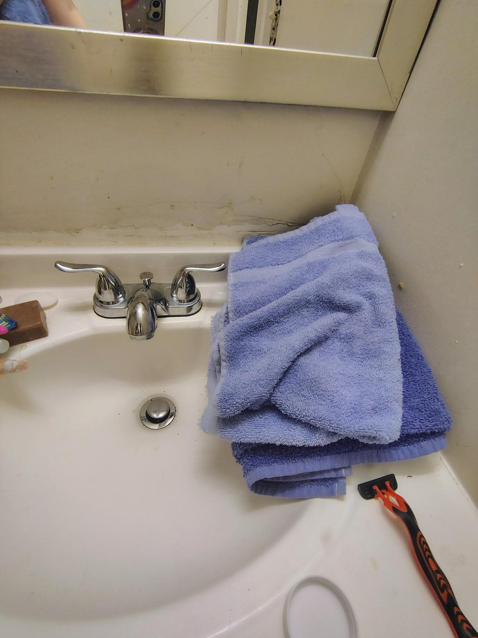 It was dirty all over the bathroom sink and cigarette burns