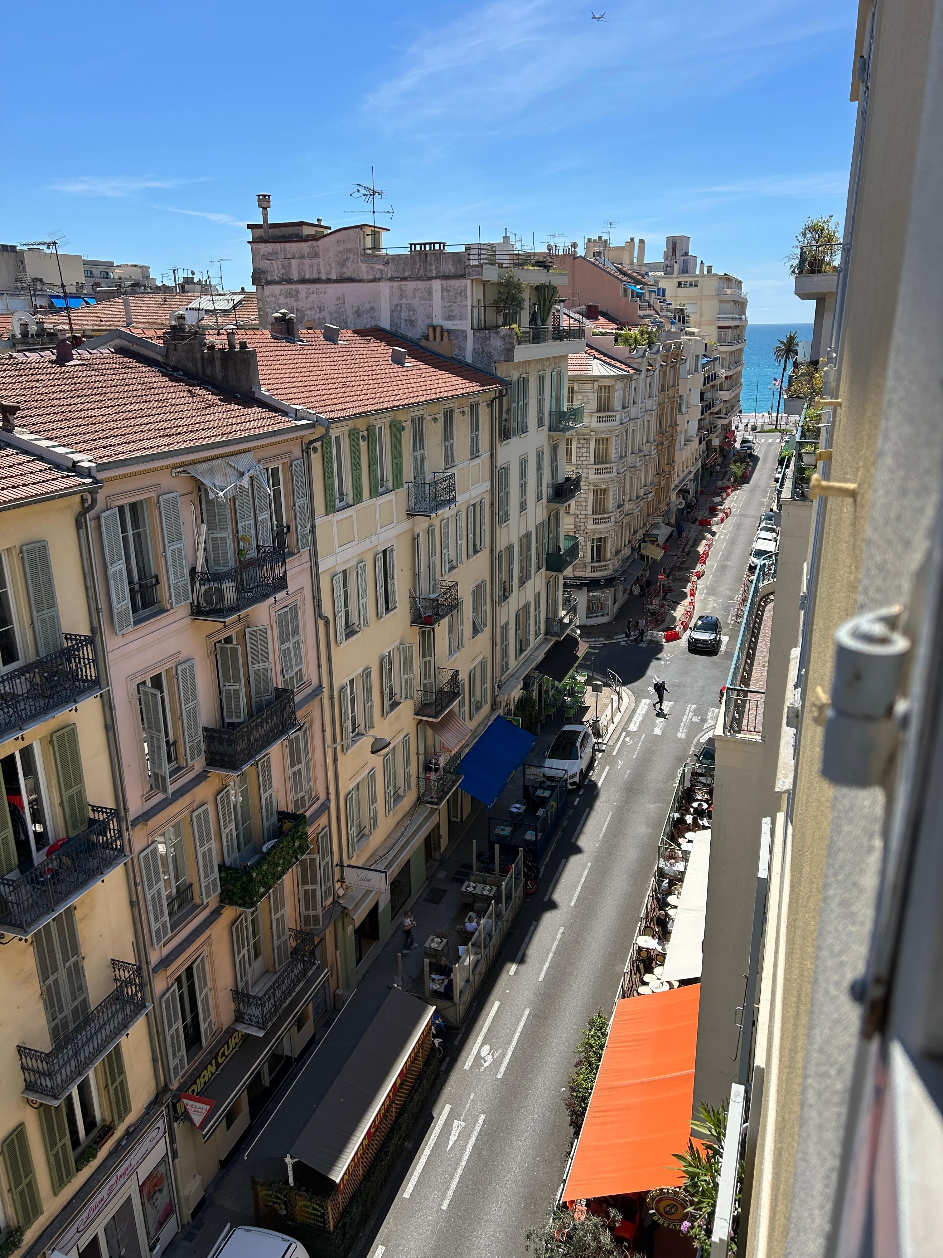 View to the right, leaning out the bedroom window