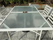 Rusted outdoor table with moldy chairs