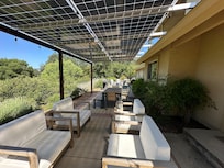 Covered patio and table were perfect for visiting and snacking.