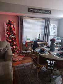 Dining area with desk and Christmas tree