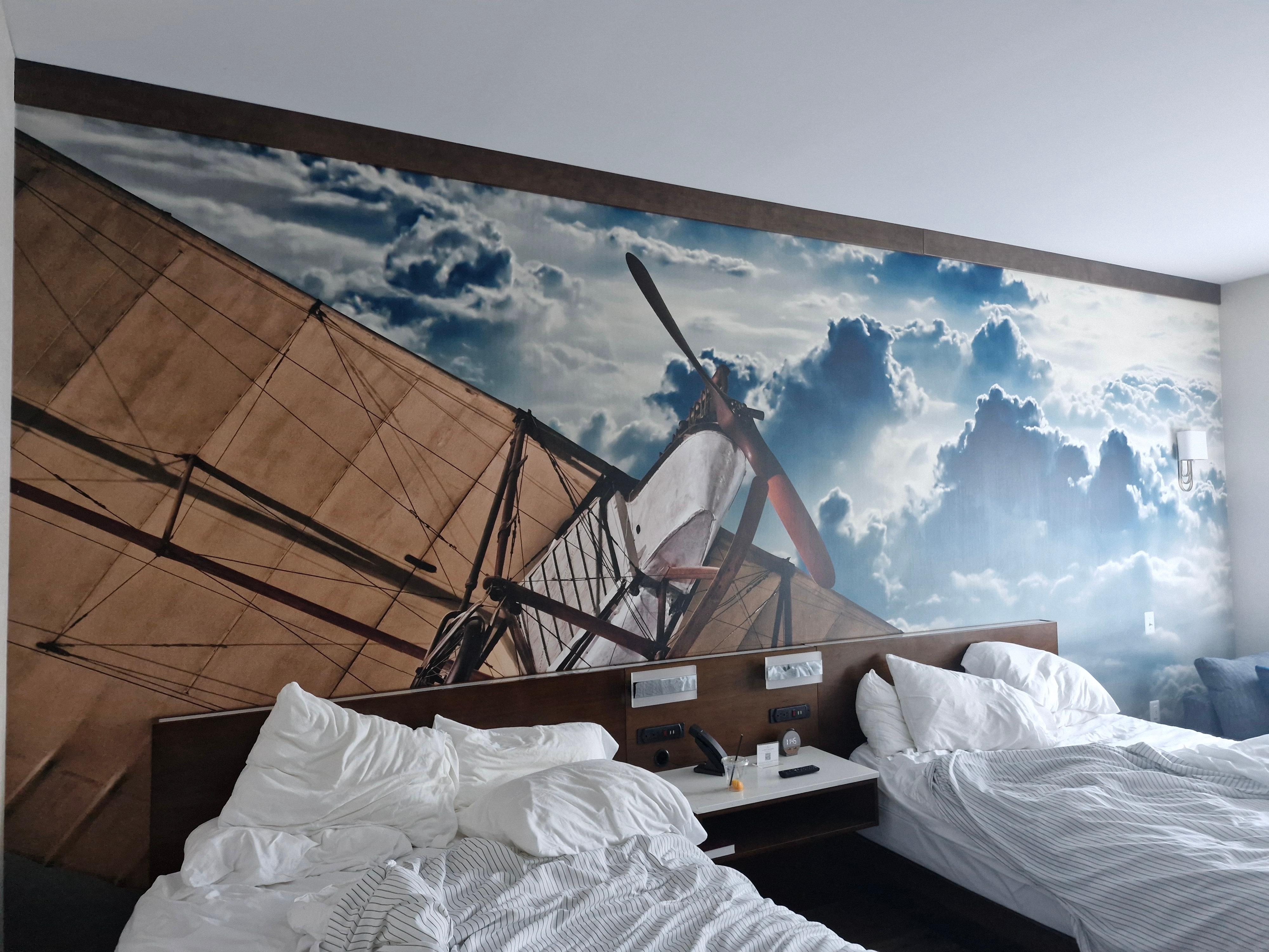 Apologies for the unmade beds, focus on the lovely mural 😉