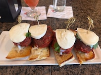 The meatball and mozzarella small plate which was delicious and I made a meal of it at the bar with a spritzer-style cocktail.