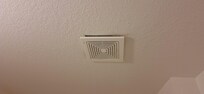 The loud exhaust fan hanging from the ceiling