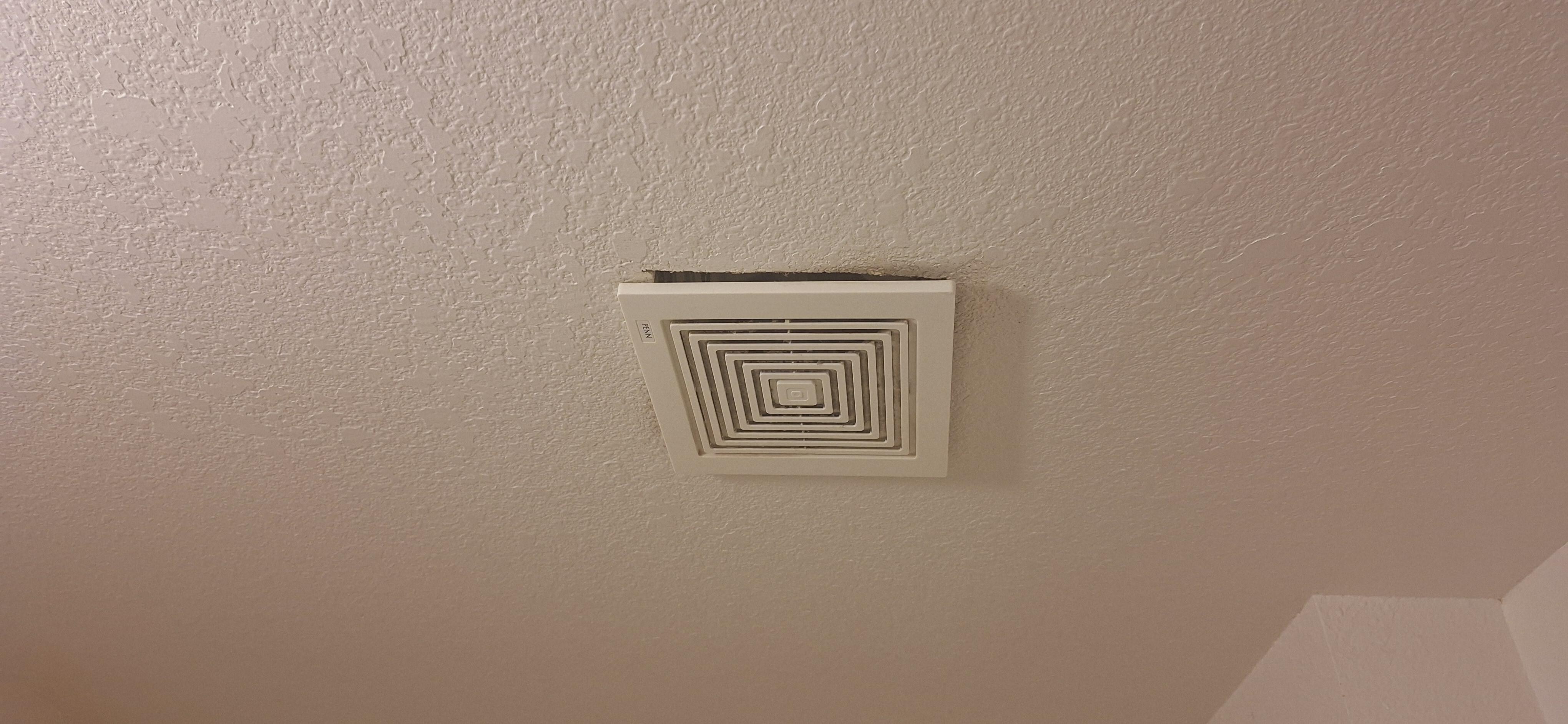 The loud exhaust fan hanging from the ceiling