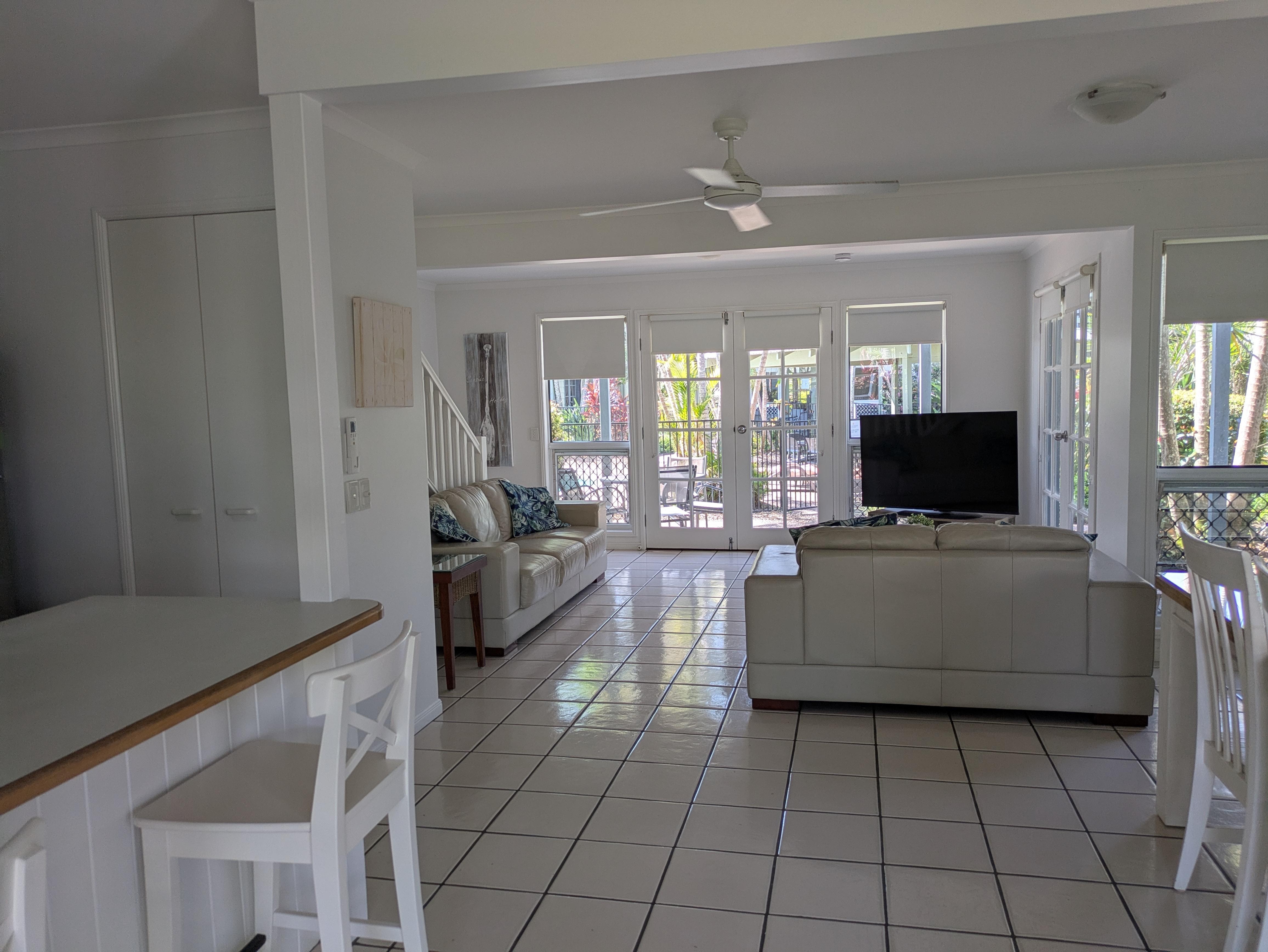 French doors to the pool & gardens... 