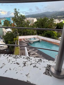 View of the pool and mountains from our balcony