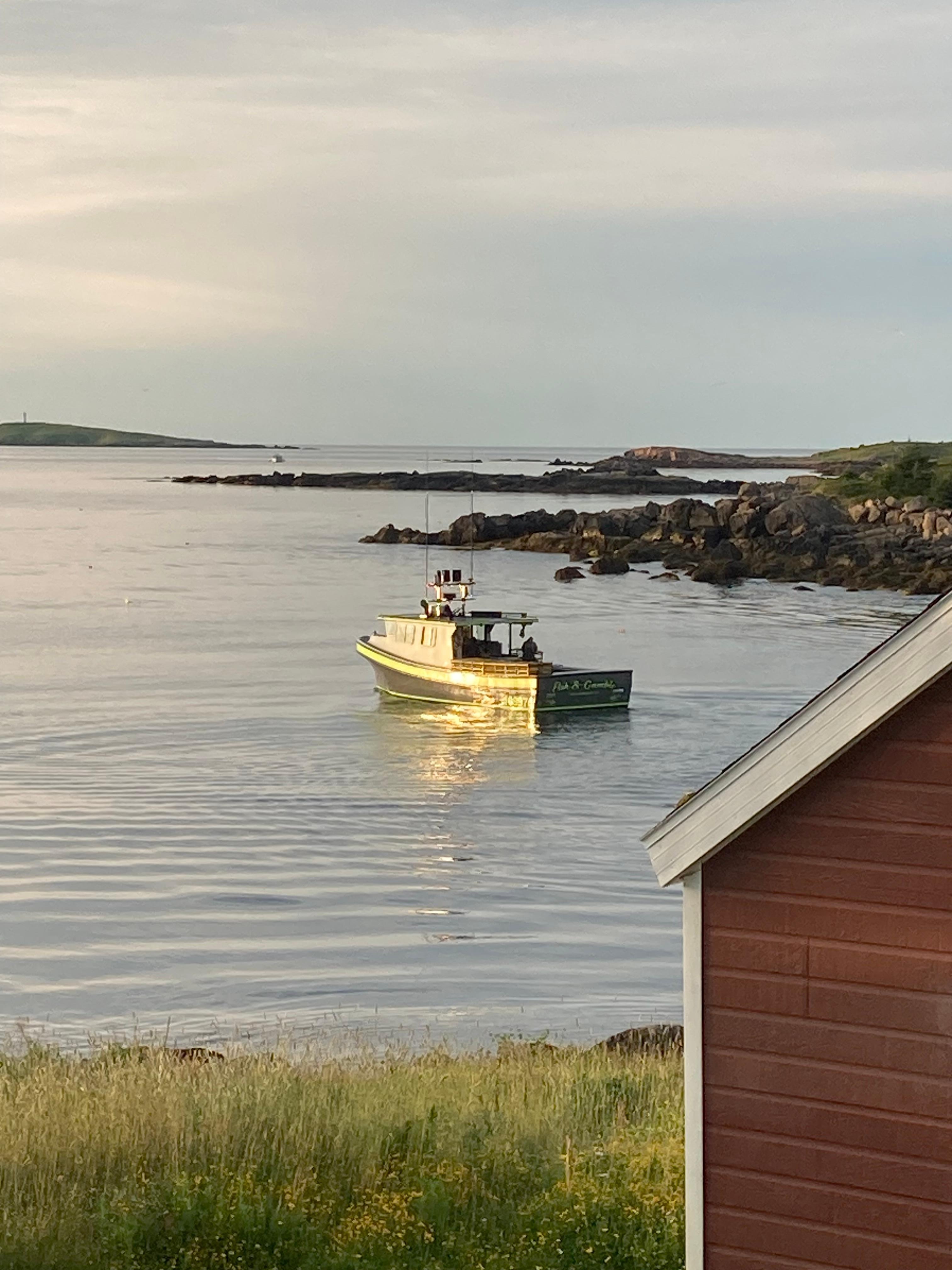A lobster boat after hauling in their catch.