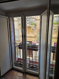 Double Double window doors…..yes two sets of double pane doors to keep the noise out.