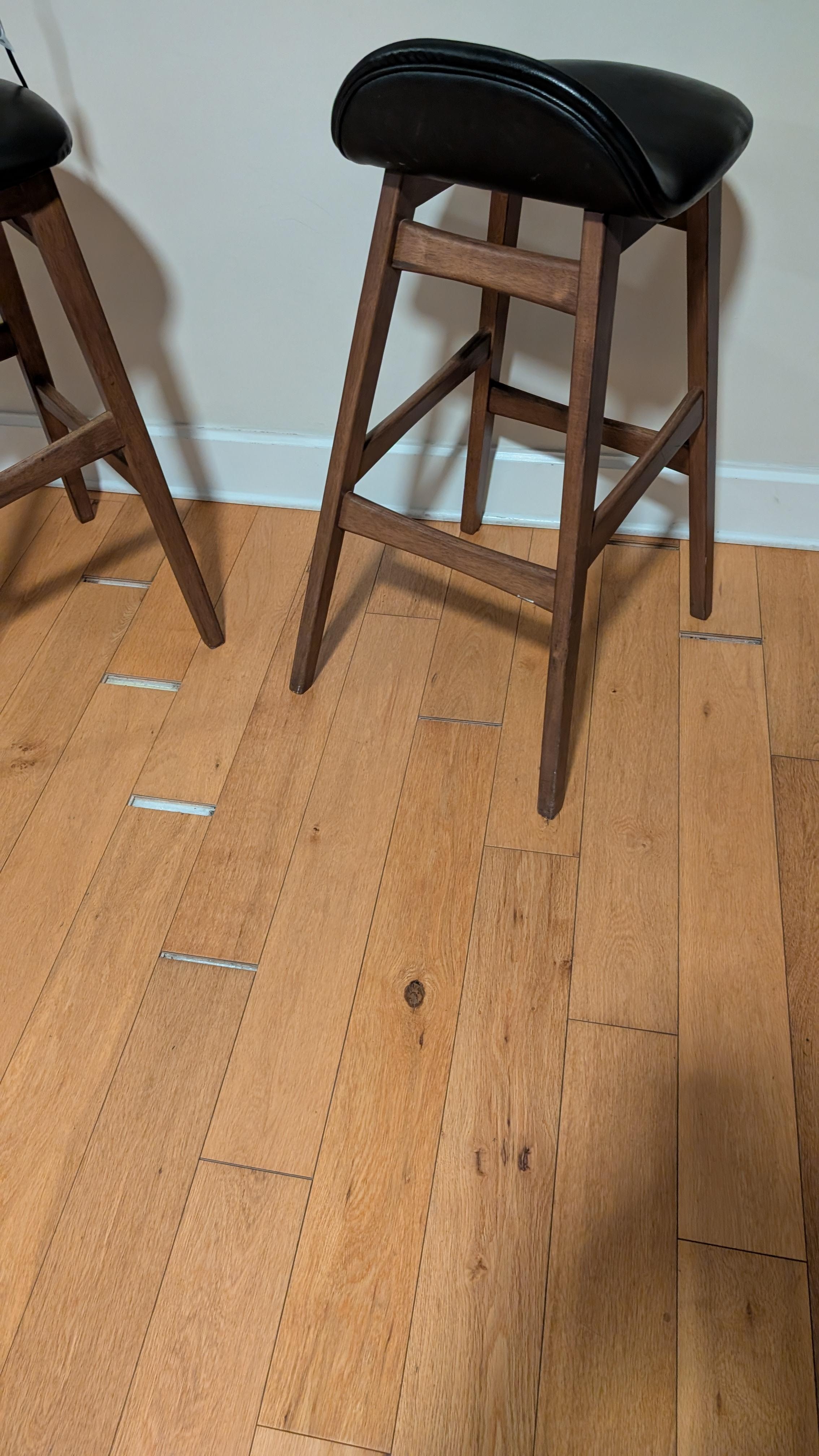 Floor is not matched up with holes that you can get the stools legs stuck in them.