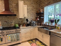 Lovely kitchen….coffee and espresso machines, lovely touches.