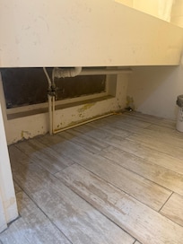 Hole to the outside under the bathroom sink