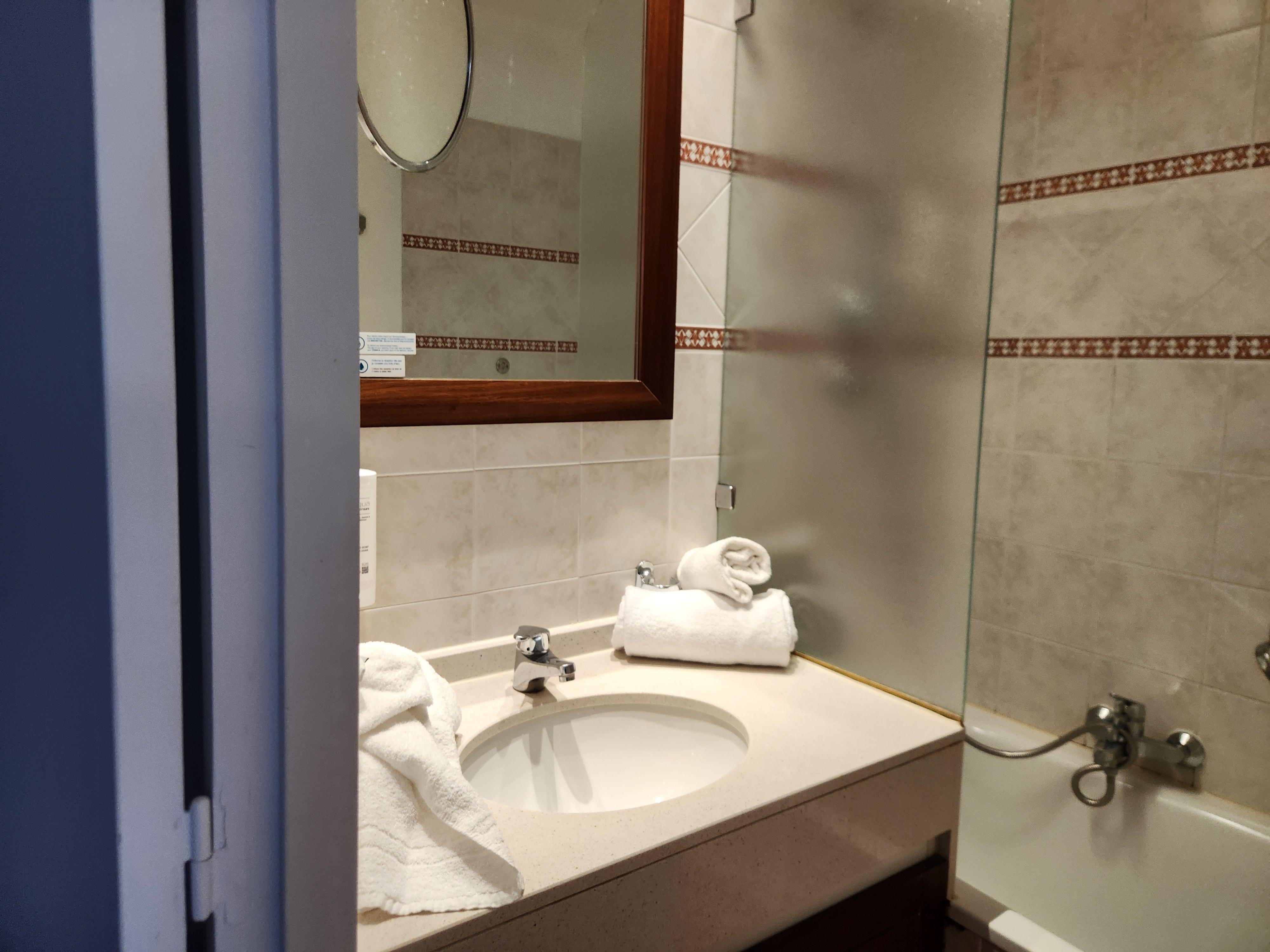 Bathroom is broken up into two sections.  