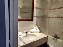 Bathroom is broken up into two sections.