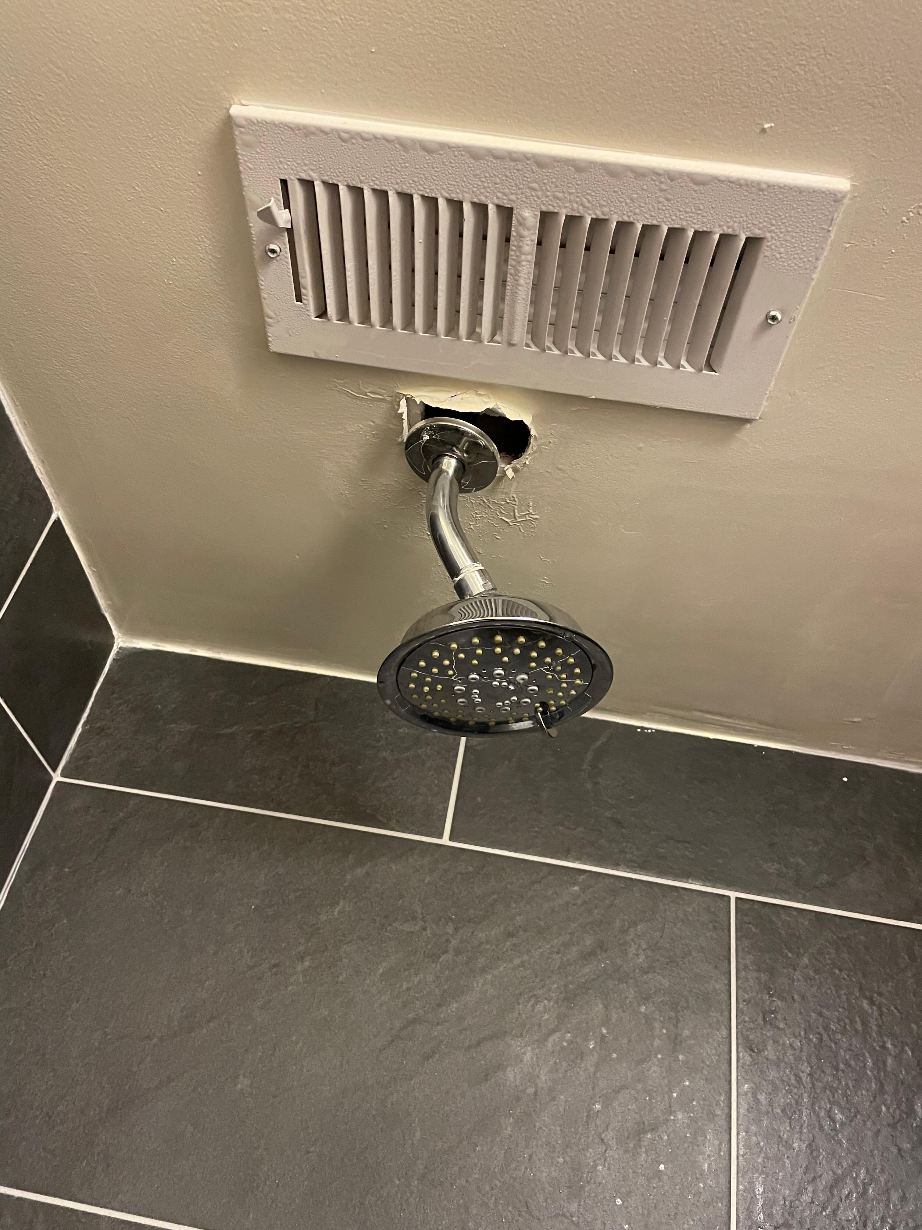 shower head coming out of the ceiling