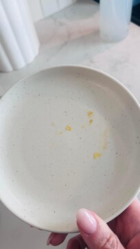A plate we pulled from the cabinet was crusted over with food from a prior guest. Fortunately, a dishwasher is available in the room.
