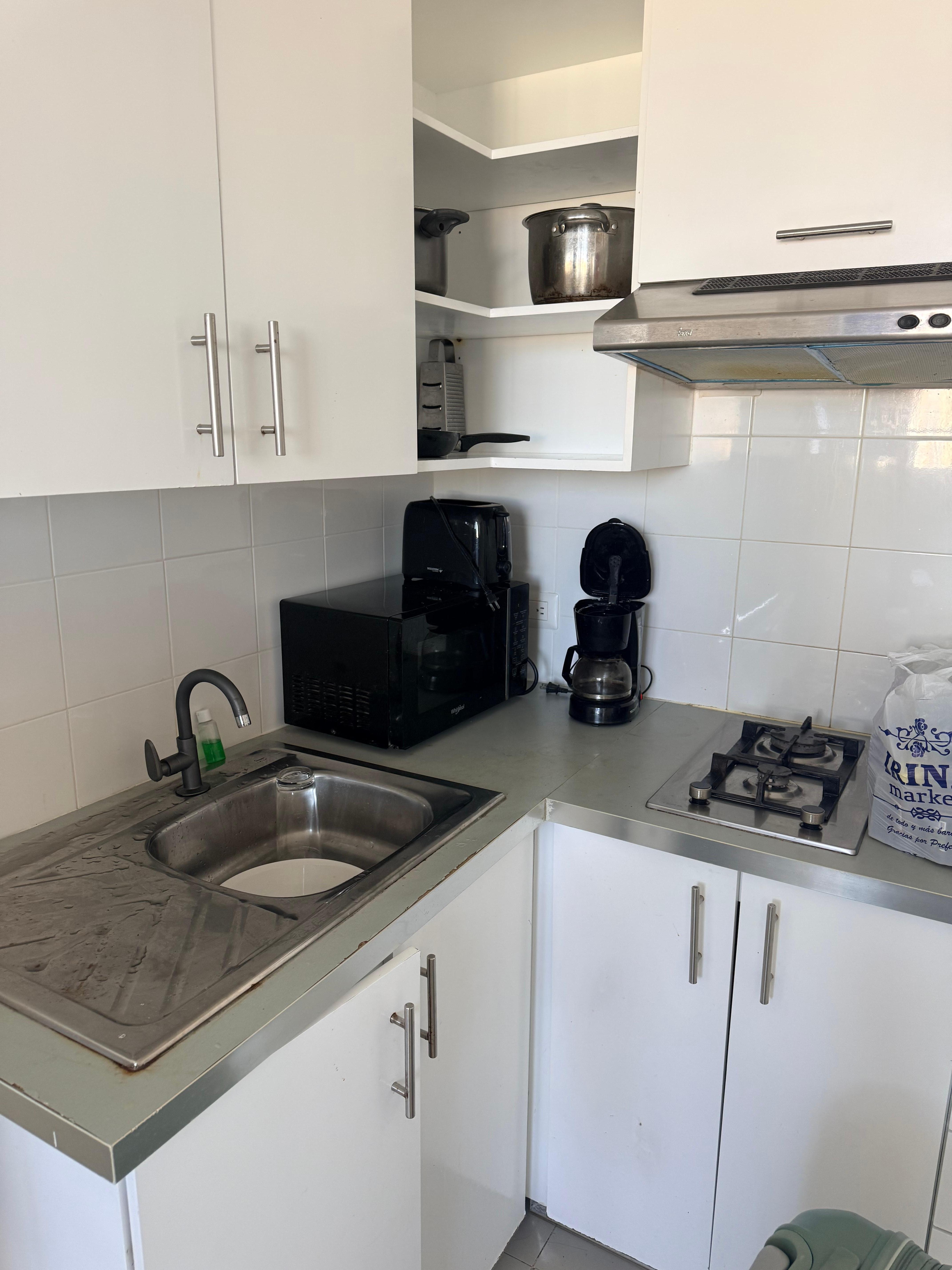 This was NOT a “fully stocked” kitchen. 2 pots 1 small pan, old and rusty. WATER AS PROMISED WAS NOT INCLUDED. 