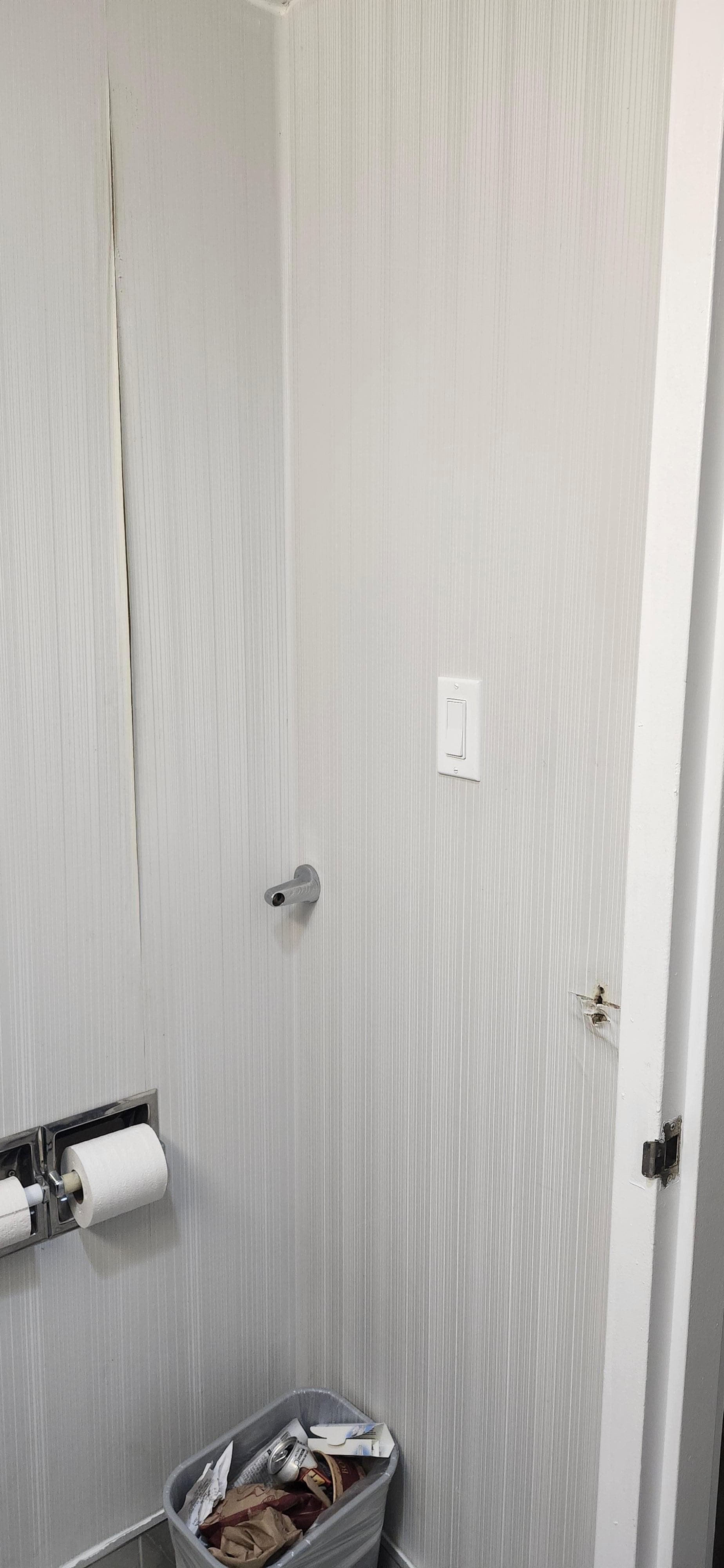 Towel rack seemingly ripped out of the wall