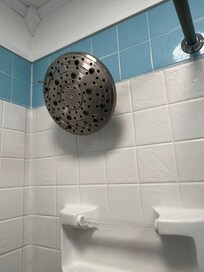 A rain shower head installed as a regular shower head. One could drownđ© An actual hazard â ïž
