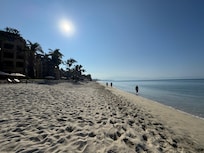 Beach immediately off the pool