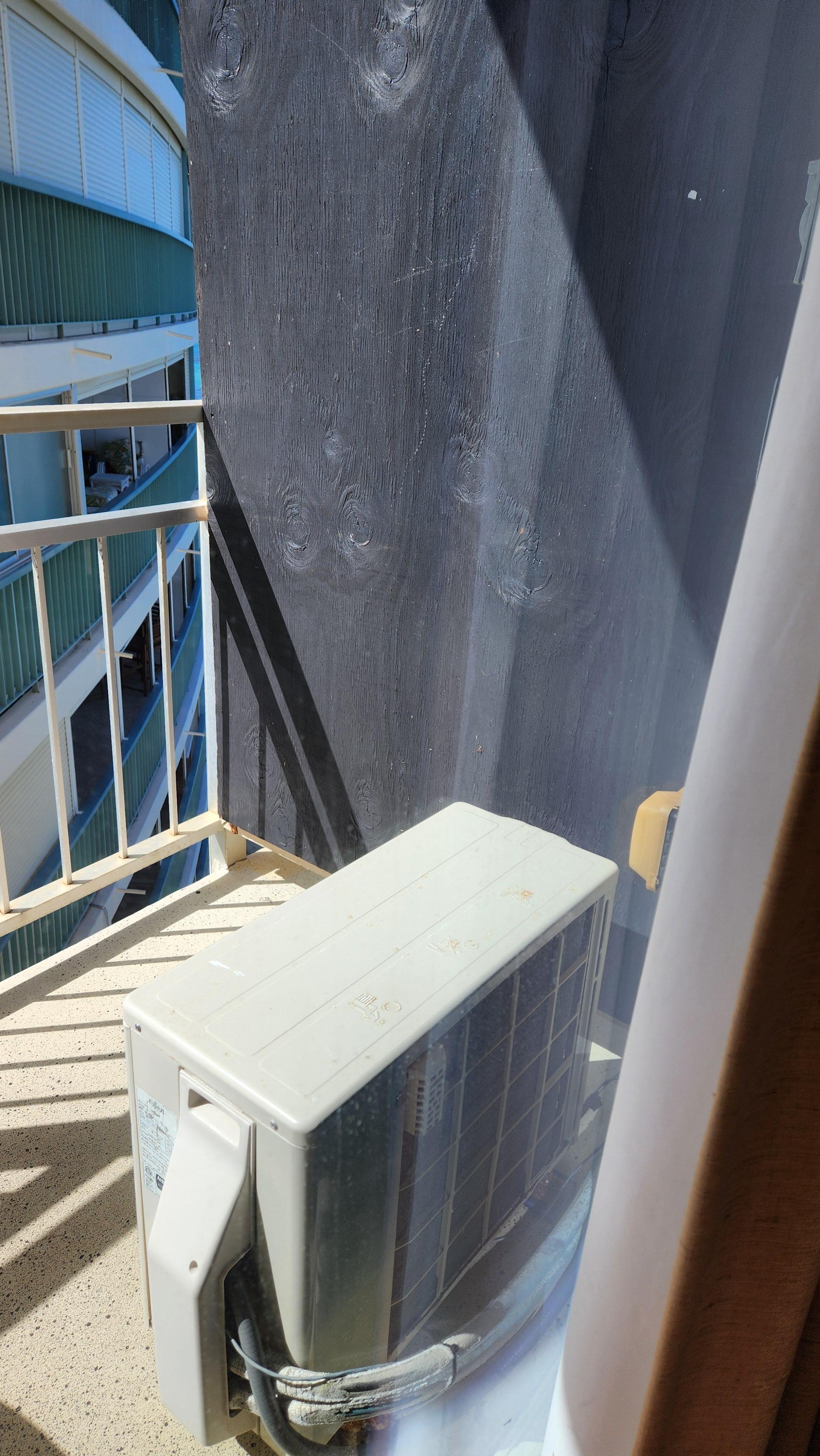 Rusty, dirty, plywood divider.