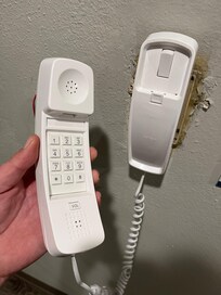 Broken “courtesy” phone. Doesn’t matter, I used my cell and no one answered anyway. I could hear it ringing and left frantic messages.