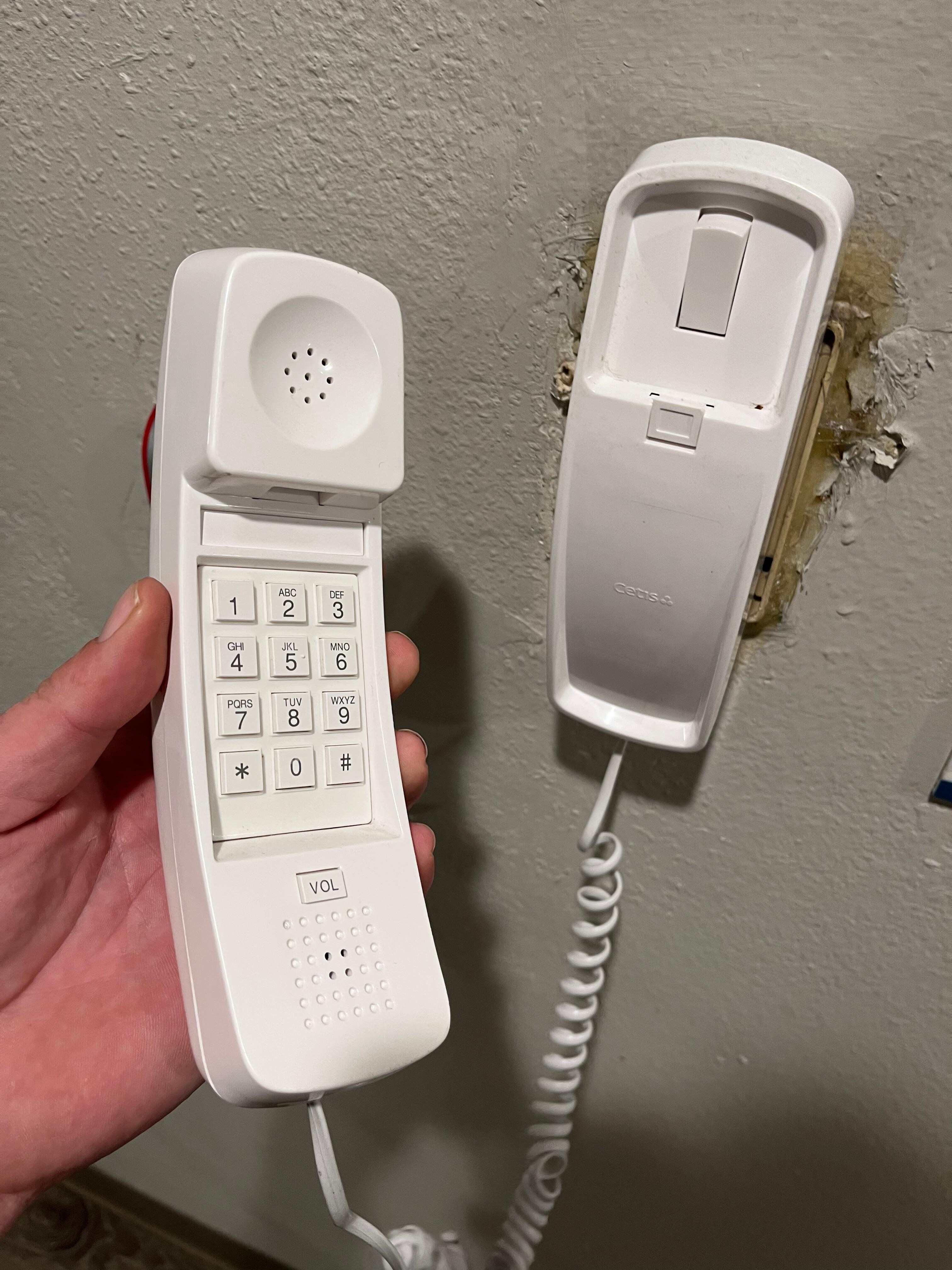 Broken “courtesy” phone. Doesn’t matter, I used my cell and no one answered anyway. I could hear it ringing and left frantic messages.