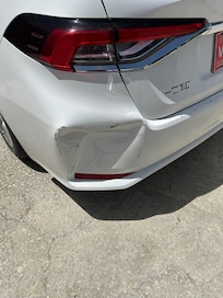 Car hit in road due to no access to back gate