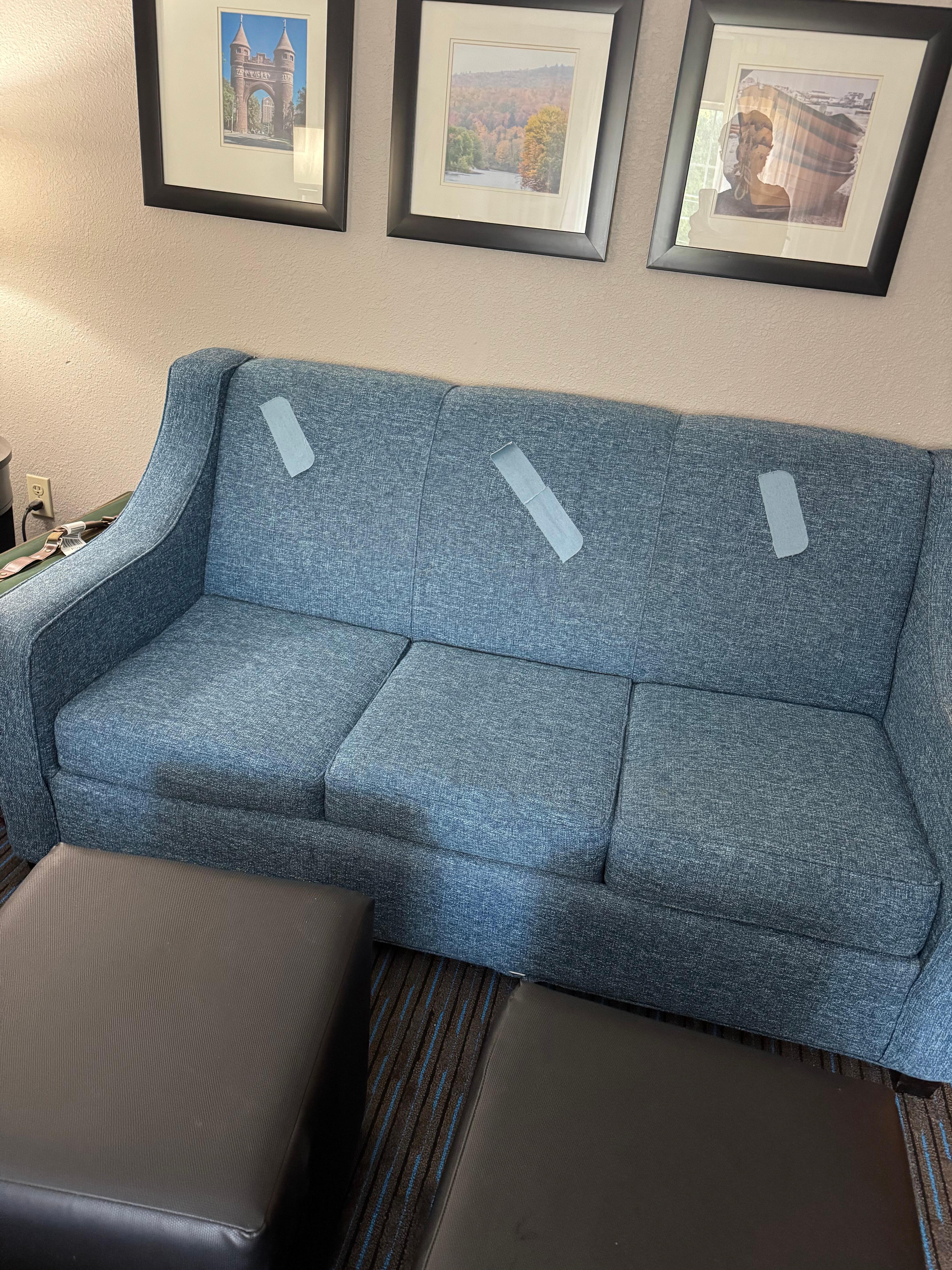 Sleeper sofa with ripped back cushions covered with tape☹️