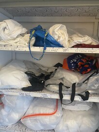 Cupboards full of un-ironed bedding