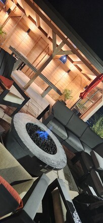 Sitting area with firepit, pool and other activities