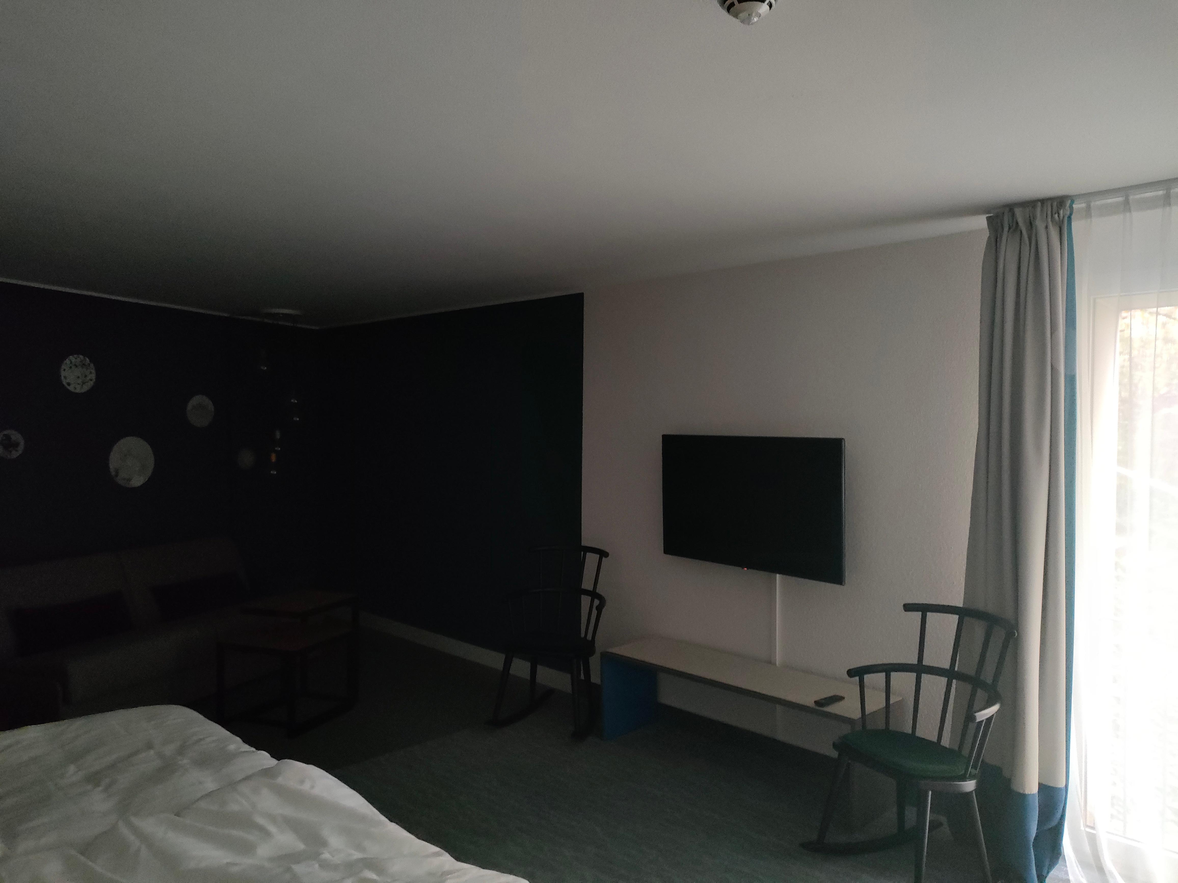 Rooms and corridors dark and unwelcoming. 