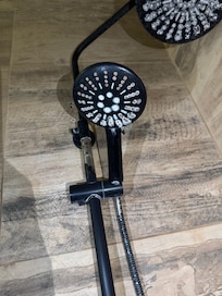 Shower head full of mold. Hot water on and off.