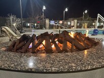 Pool area with fireplaces!