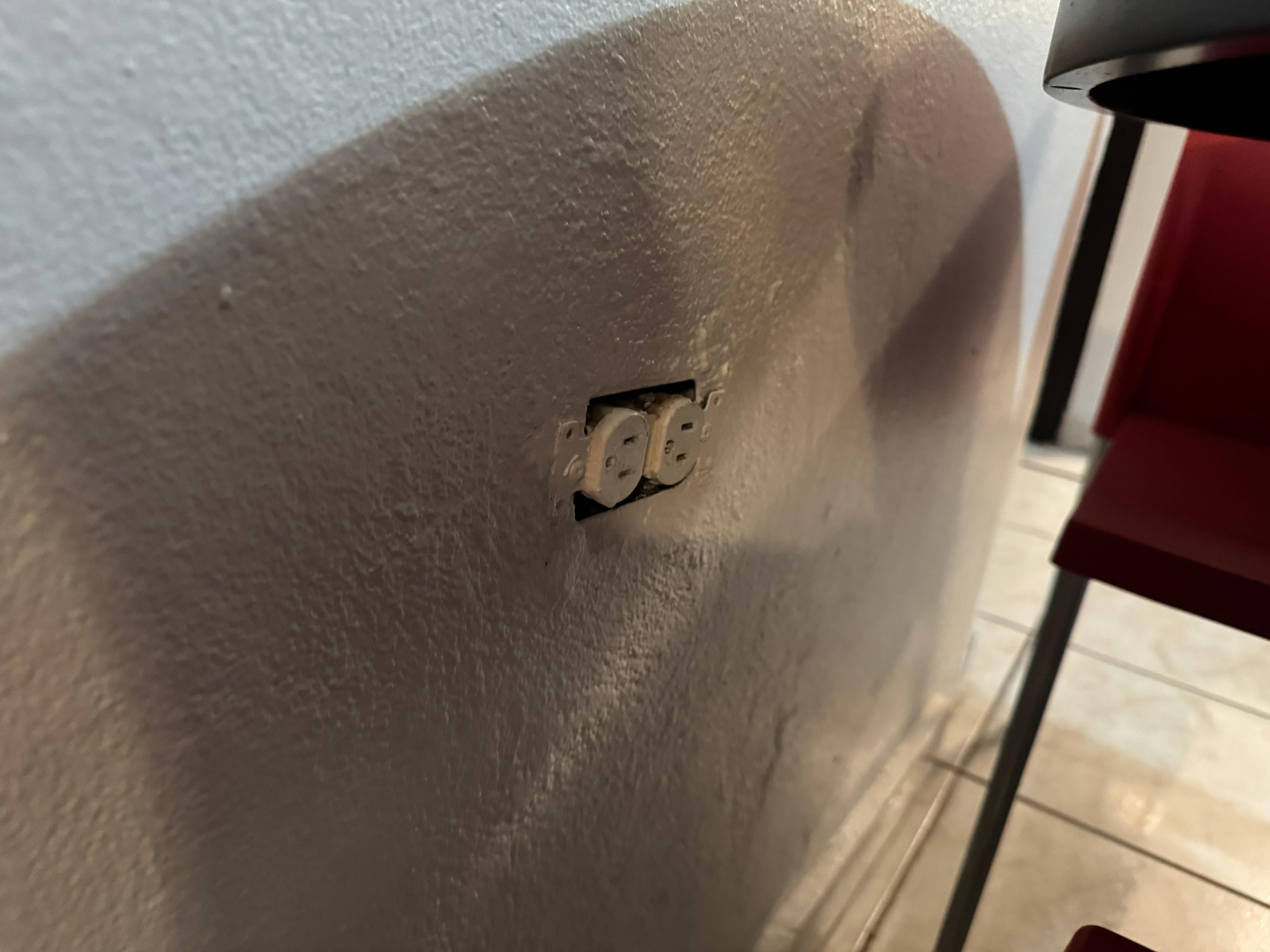 uncovered outlet near kitchen table. Directly at height of 3yr old.