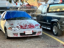 Junk autos in parking lot