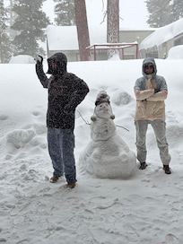 A snowman just outside the front door!