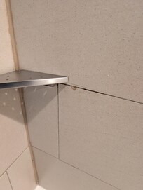 Grout that wasn't properly put in place.