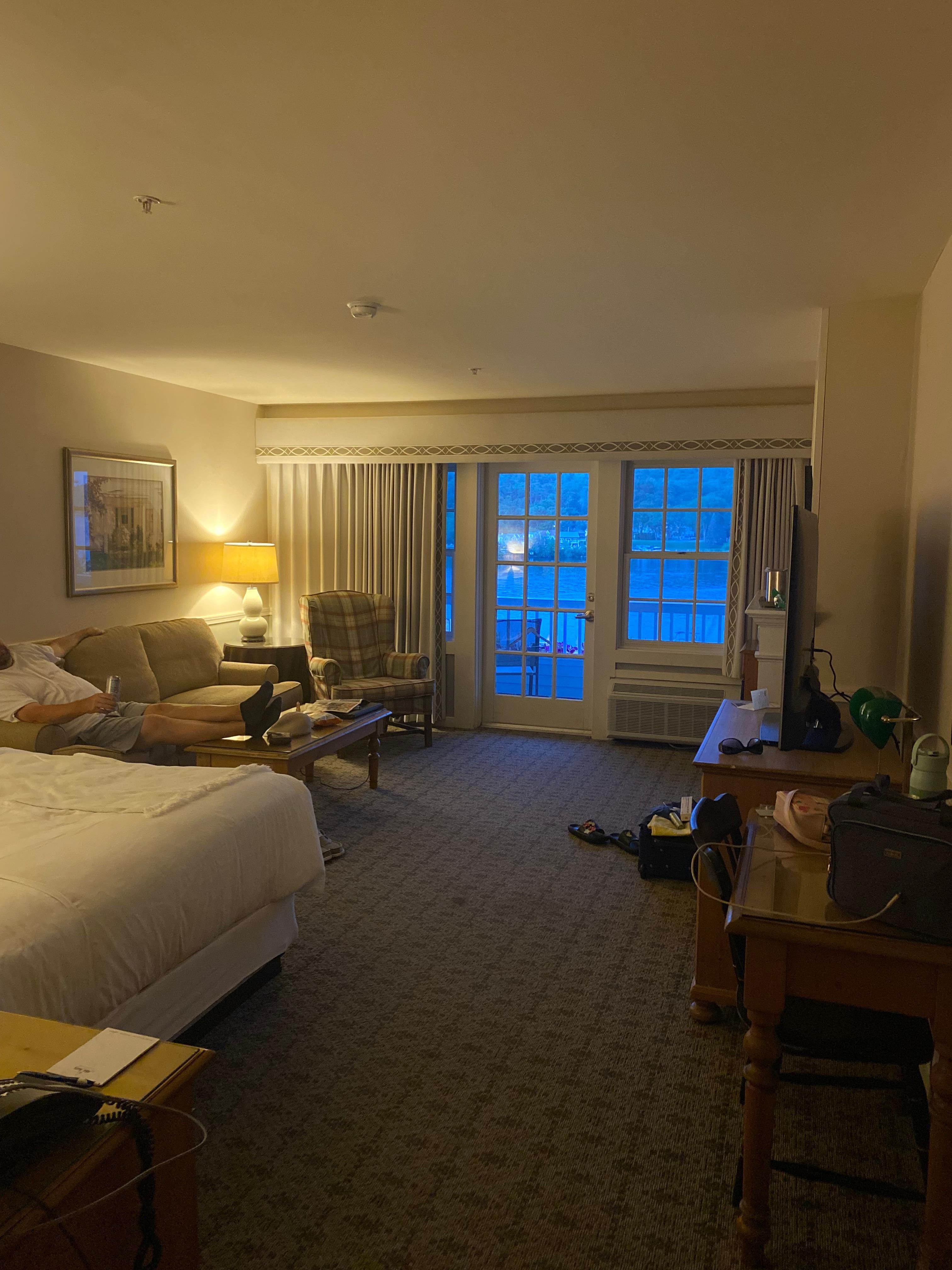 King room with balcony and fireplace. 