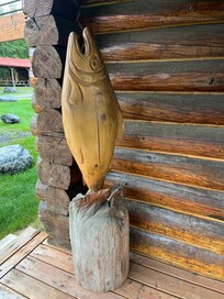 Wood carving on cabin porch