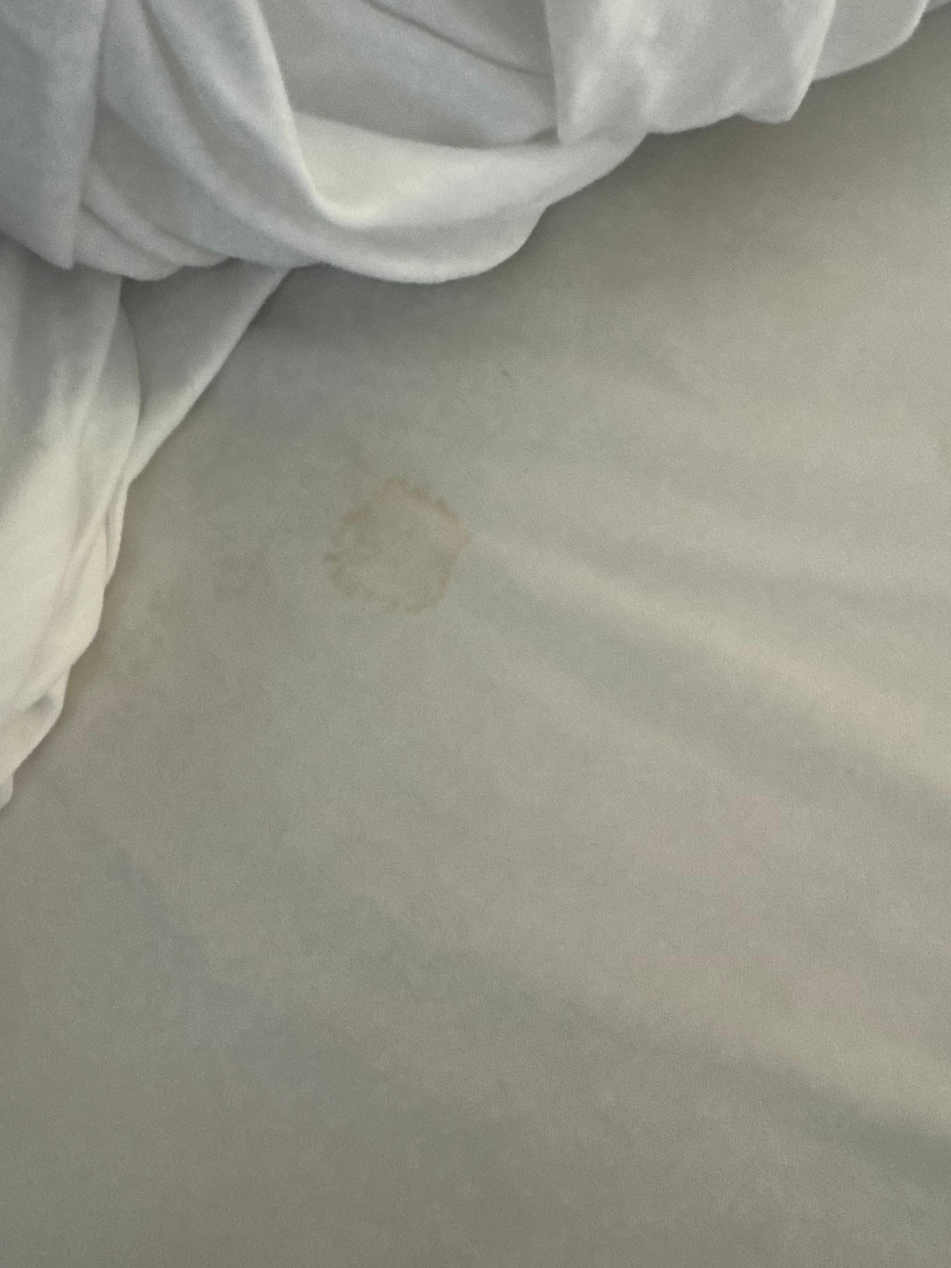 Stain on sheet.